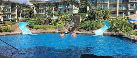 Resort style swimming pool with two slides