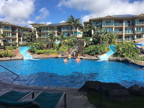 Resort style swimming pool with two slides