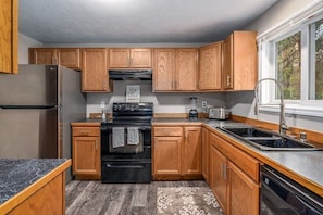 Full Kitchen Microwave is located on counter on left. Main Floor with dining room access.