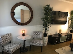 65" Smart HD TV w/ Cox cable, sitting area