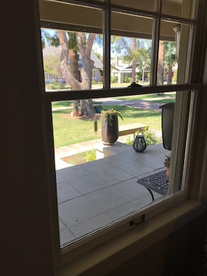 View out the front window and from the front porch. Neighborhood is amazing!