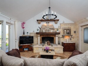 Living Room, Room, Furniture, Interior Design, Property, Ceiling, Wall, Table, Building, Floor