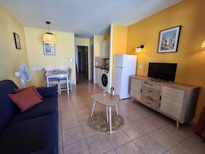 Furniture, Picture Frame, Property, Table, Wood, Interior Design, Floor, Flooring, Living Room, Home Appliance