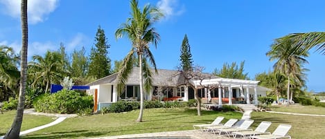 Private beachfront estate, On the Rocks, located on a mile-long pink-sand beach.