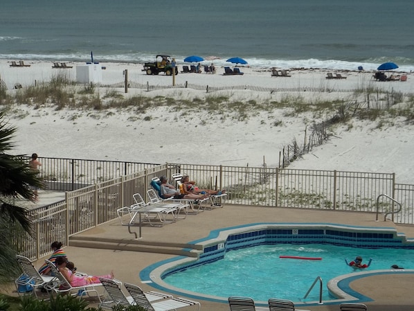 View from balcony of pool and beach