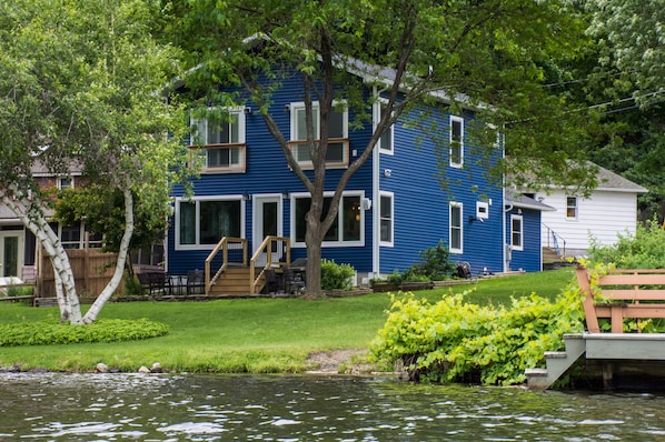 Large lakeside yard and patio area