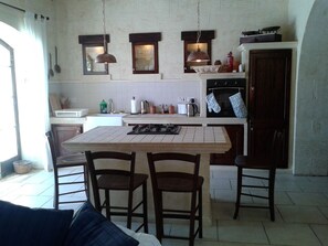 kitchen with island facing pool area