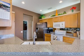 Refrigerator with ICE MAKER, Microwave, flat-top Stove, Dishwasher, Coffee Maker