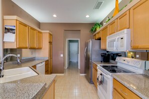 Kitchen before new flooring and paint