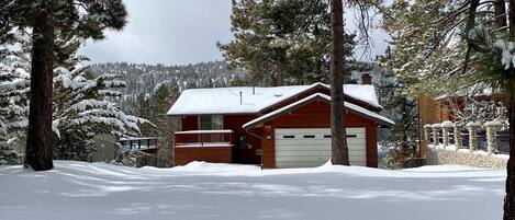 Snow covered Big Bear Cool Cabins, Rustic Vintage Lakefront front