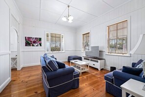Main lounge with Smart TV and two huge  couches