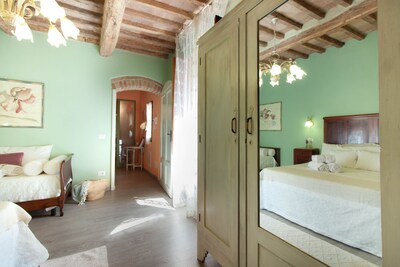 The house is located in the heart of Tuscany, in the historic center of San Gimignano.