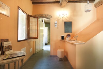 The house is located in the heart of Tuscany, in the historic center of San Gimignano.