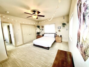 East upstairs bedroom with queen bed and organic mattress. 