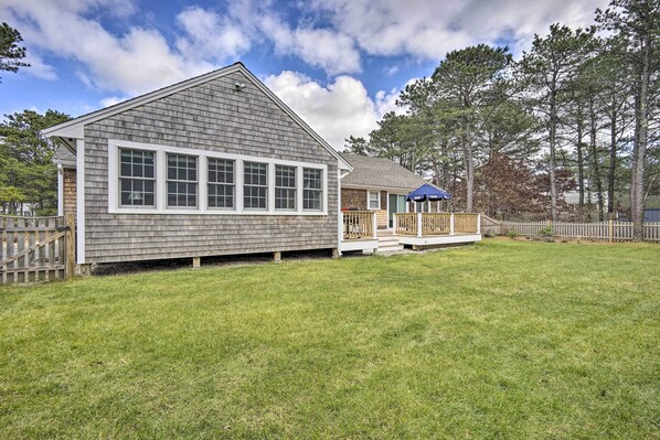Fully fenced and landscaped, the backyard is perfect for leisurely afternoons.