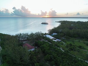 Moonflower (with red roof) set on its own secluded corner of Gaulding Cay.