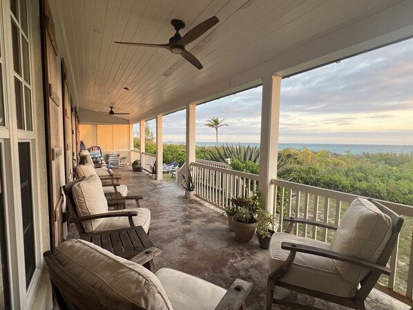 Beachfront porch of the French Leave Villa