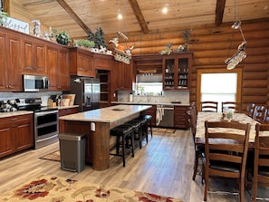 Kitchen has lots of space with an open pantry and all the conveniences needed.