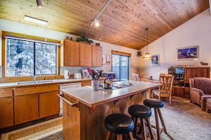 Kitchen with bar seating for 3