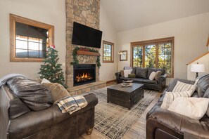 Main level family room with sleeper sofa.