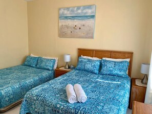 Rear Bedroom with Queen Bed + Extra Queen Aerobed setup.