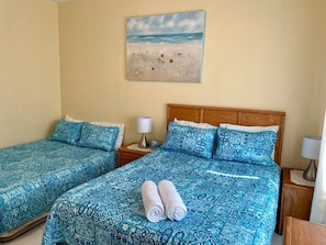 Rear Bedroom with Queen Bed + Extra Queen Aerobed setup.