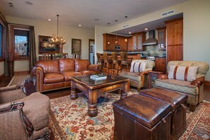 Living area, dining room and kitchen view