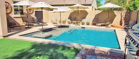 Our Fiesta Pool Park is in the property's backyard, BBQ, firepit, patio lounge!