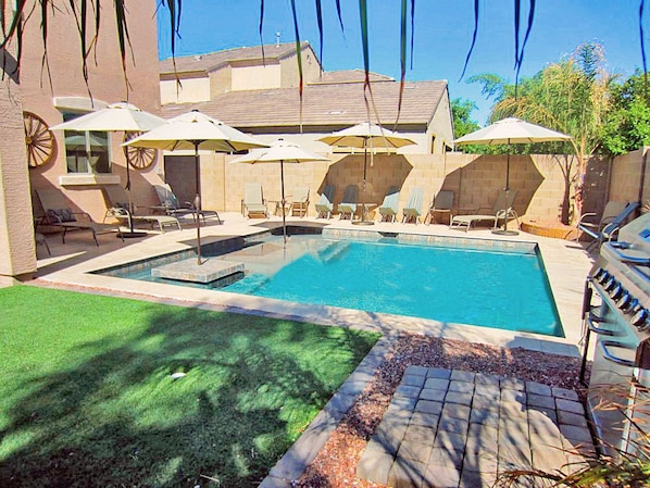 Our Fiesta Pool Park is in the property's backyard, BBQ, firepit, patio lounge!