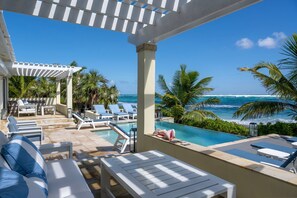 Covered patio and our new infinity heated pool.