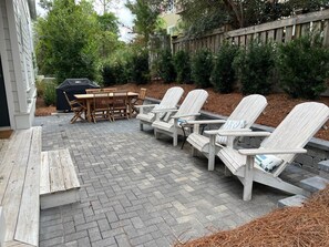 New expanded back patio, TV on deck as well, and new bushes to add privacy