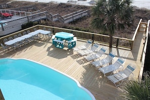 PLENTY OF ROOM TO SUN AND DINE ON THE DECK OVERLOOKING THE OCEAN