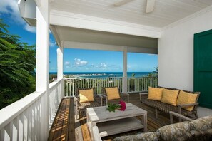 Spectacular harbor and sunset views about at Buccaneer Hill from the many verandas.