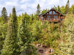 Cabin and fire pit below.