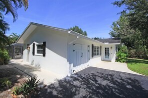 Front and Side Entrance. The front door has an electronic keypad for access.