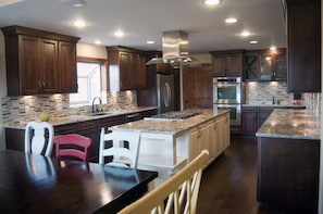 Brand new gourmet kitchen with seating for 10-12! Top of the line everything!