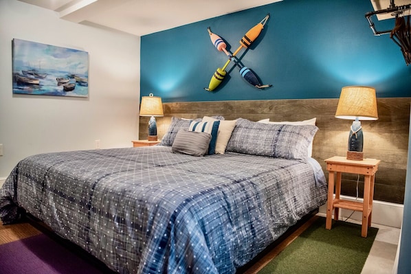 Our Nautical Quarters includes a comfy king mattress and spacious bedroom.