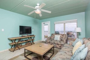 Watch a movie in the living area or step out onto the balcony to catch the real show.