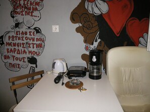 Detail of the dining area with some domestic appliances