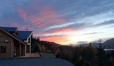 Stunning luxury Finnish log house with panoramic views over Loch Ness. 