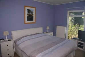 Downstairs double bedroom with built-in wardrobe, LCD tv with Blu-ray player