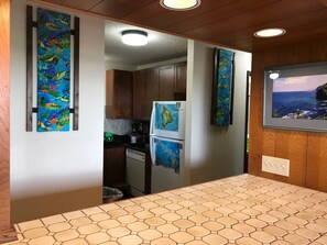 Looking into the kitchen from the dining area.