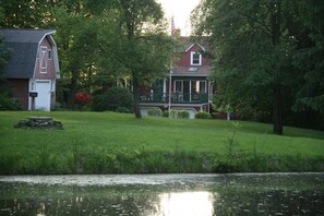 Pond, fruit trees and playing field