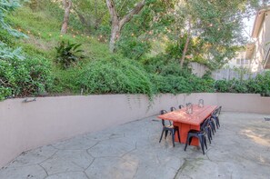 Enjoy dining al fresco and entertain family and friends in the large backyard!