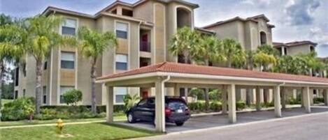 Outside view of condo and covered parking