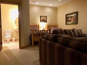 Basement Twin Room with TV, Lounge Area and Full Bath