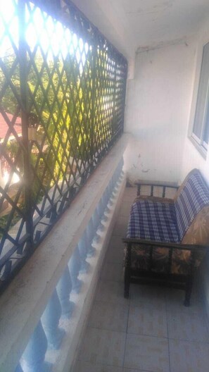 Balcony with a distant beach view