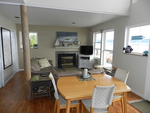 Dining & Living area, Gas Fireplace, LCD TV & views of the water