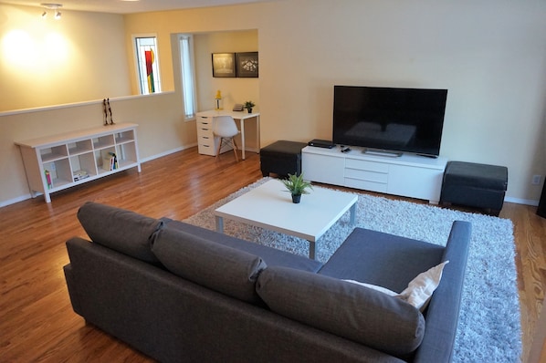 Enjoy the large, bright and spacious living room where you can sit back and rela