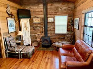 Living Room - Perfect place for a cozy snuggle or after float relaxation.